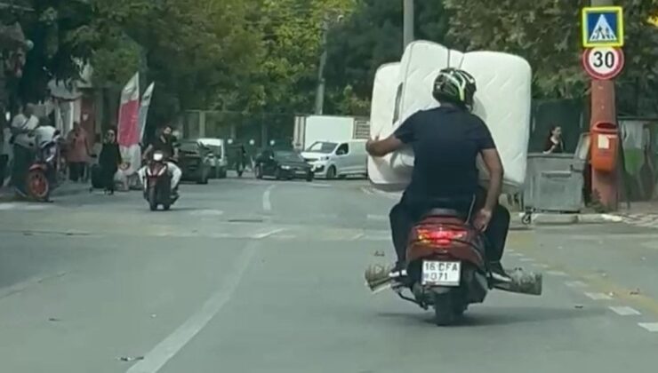 Bursa’da motosikletle yatak taşıdı