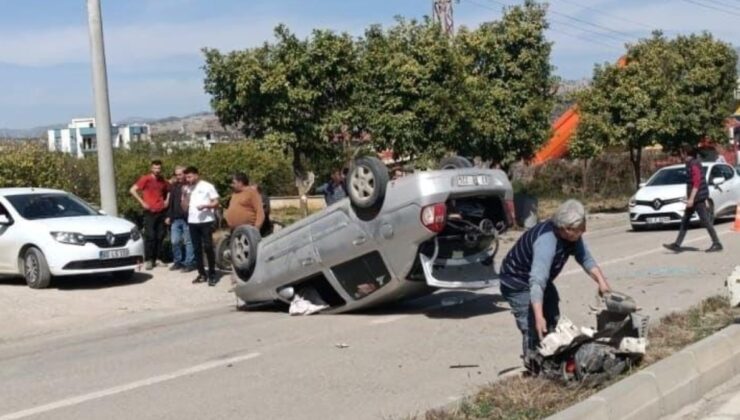 Adana’da takla atan otomobil imece usulü yola sokuldu