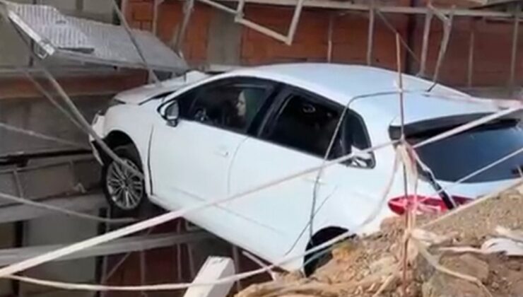 İstanbul Kartal’da kontrolden çıkan otomobil inşaat boşluğunda asılı kaldı