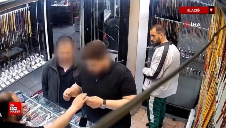 Elazığ’da saat hırsızlığı: Kameraya bakıp cebine attı