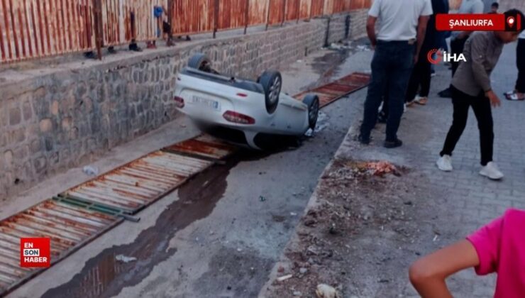 Şanlıurfa’da çocukların el frenini indirdiği araba tahliye kanalına devrildi