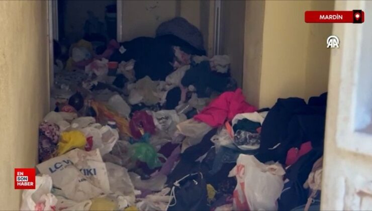 Mardin’de koku şikayeti üzerine girilen konuttan 2 kamyon çöp çıkarıldı