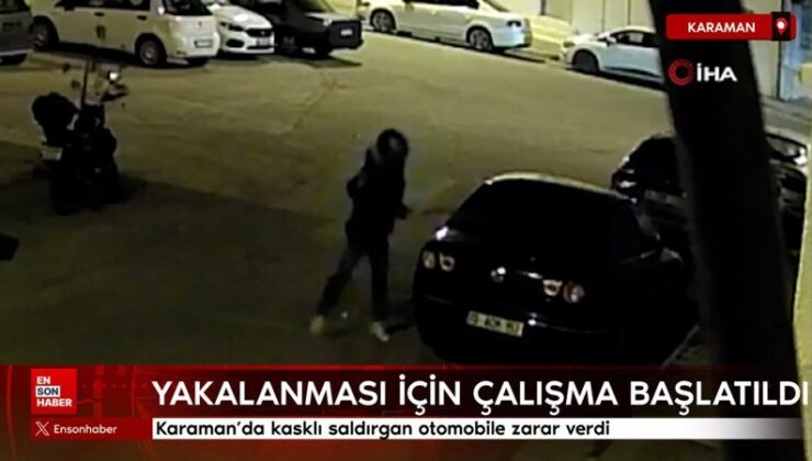 Karaman’da kasklı saldırgan arabaya ziyan verdi