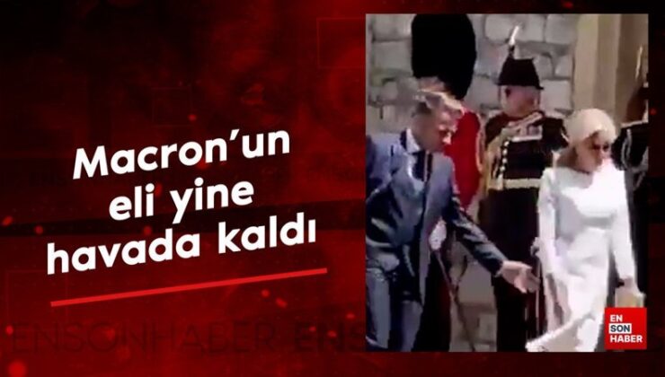 Macron eşinin elini tutmak istedi: Eli yeniden havada kaldı