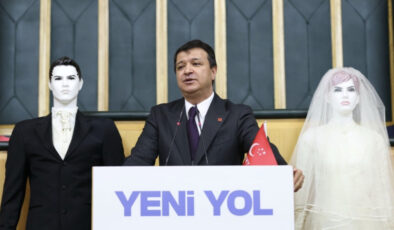 TBMM’de değişik aksiyon: Mahmut Arıkan kürsüye gelin ve damat modeliyle çıktı