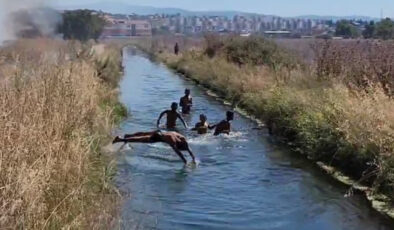 Bursa’da yangına karşın su kanalında yüzdüler