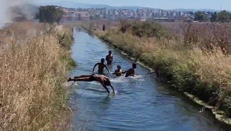 Bursa’da yangına karşın su kanalında yüzdüler