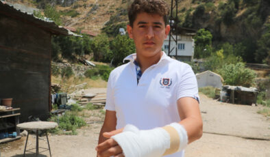 Hatay’da yangın meskenine sıçramasın diye uğraşırken yamaçtan kopan kaya modülü elini kırdı