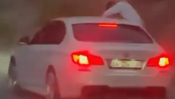 Muğla’da trafikte reaksiyon çeken imaj: Camdan sarktı, sigara izmaritini yola attı