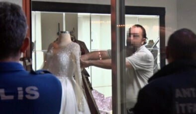 Antalya’da eşinin kendisinden habersiz sattığı gelinlikçiyi yakmaya çalıştı