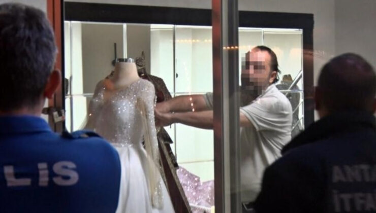 Antalya’da eşinin kendisinden habersiz sattığı gelinlikçiyi yakmaya çalıştı