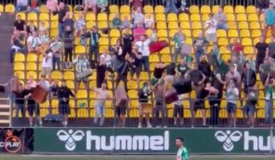 Litvanya’da taraftarlar alana bavul fırlattı